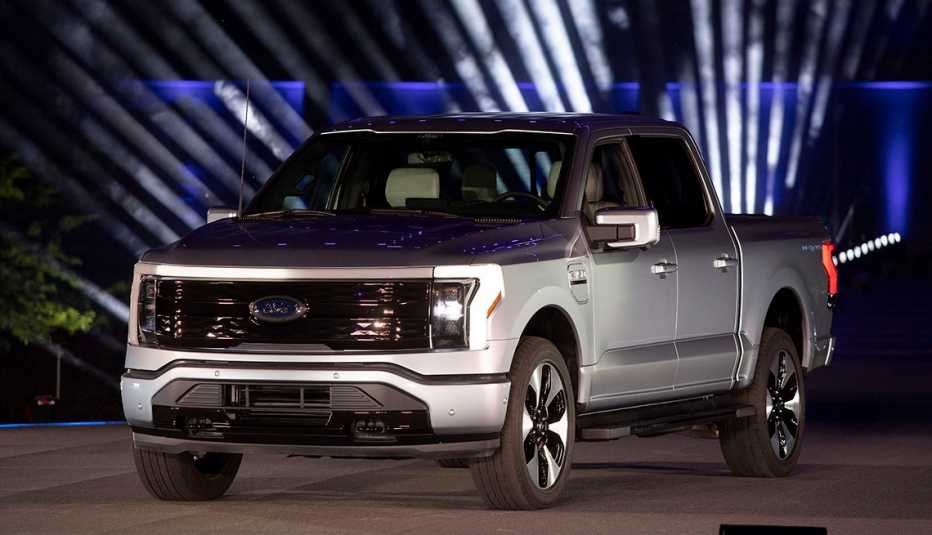 a silver gray ford f-150 lightning on display