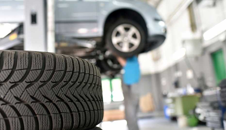 Mechanic fixing car at an auto shop