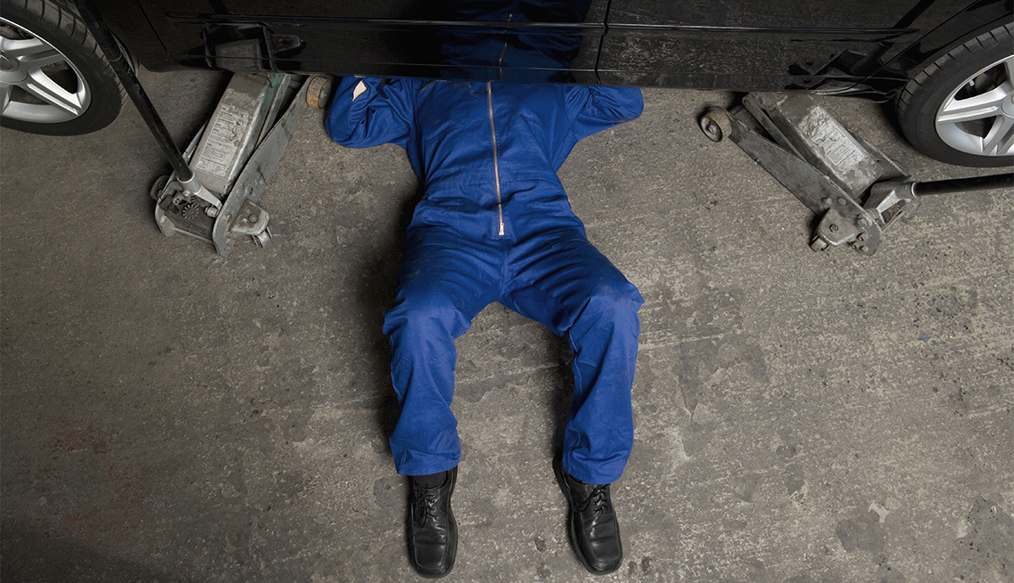 mechanic performing maintenance on a vehicle