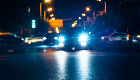 a car driving at night a car driving at night