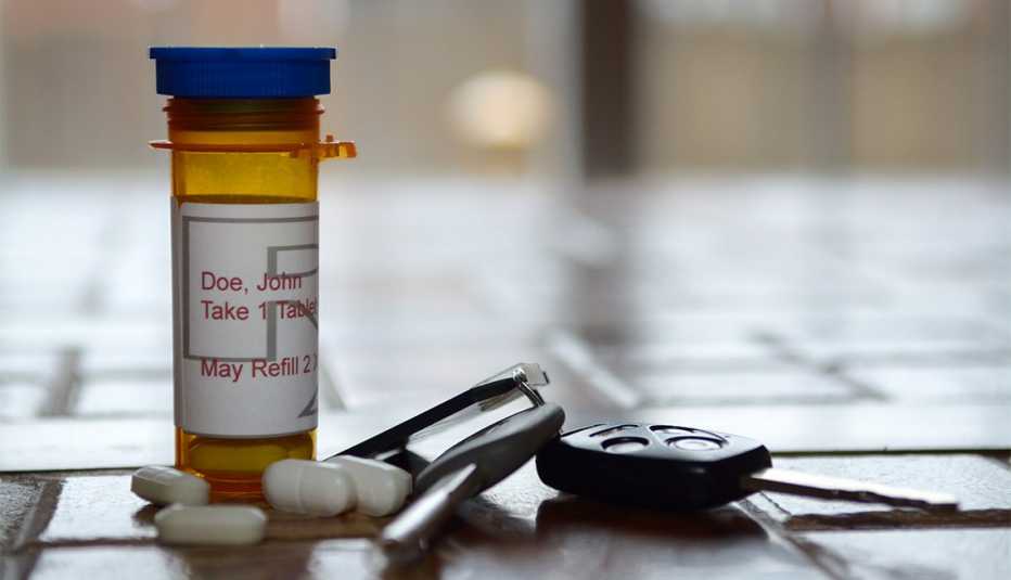 Pill bottle and keys