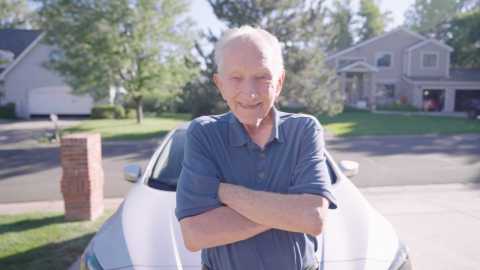 robbie robinson stands in front of a vehicle in a residential neighborhood robbie robinson stands in front of a vehicle in a residential neighborhood