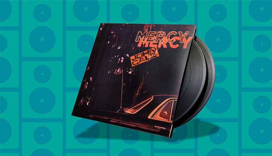 music album cover with two records sticking out of it; words mercy, john cale on cover