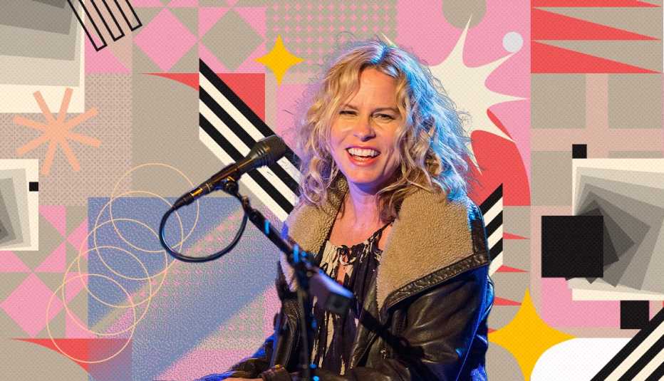 vonda shepard on colorful, flashy background with all sorts of shapes and symbols