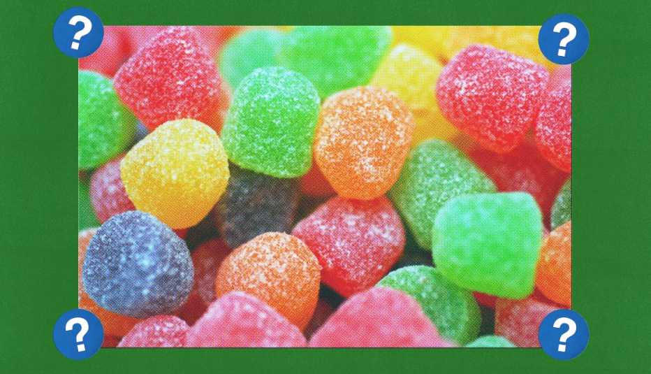 Green, red, orange, yellow and purple gumdrops; surrounded by blue circles with question marks in them