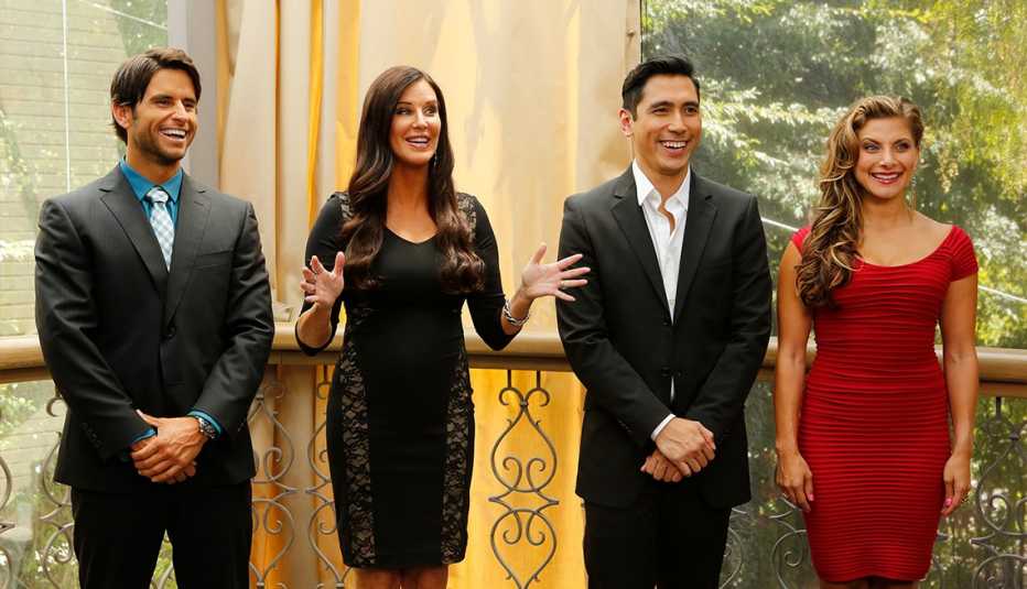 Justin Bird, Patti Stanger, David Cruz and Marisa Saks dressed up and smiling