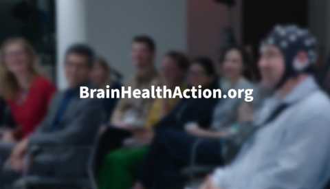 People sitting at the Music & Brain Health Summit with the text "BrainHealthAction.org"