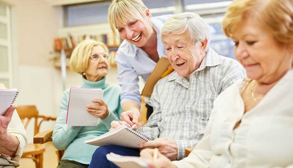 Group therapy session with  demented seniors