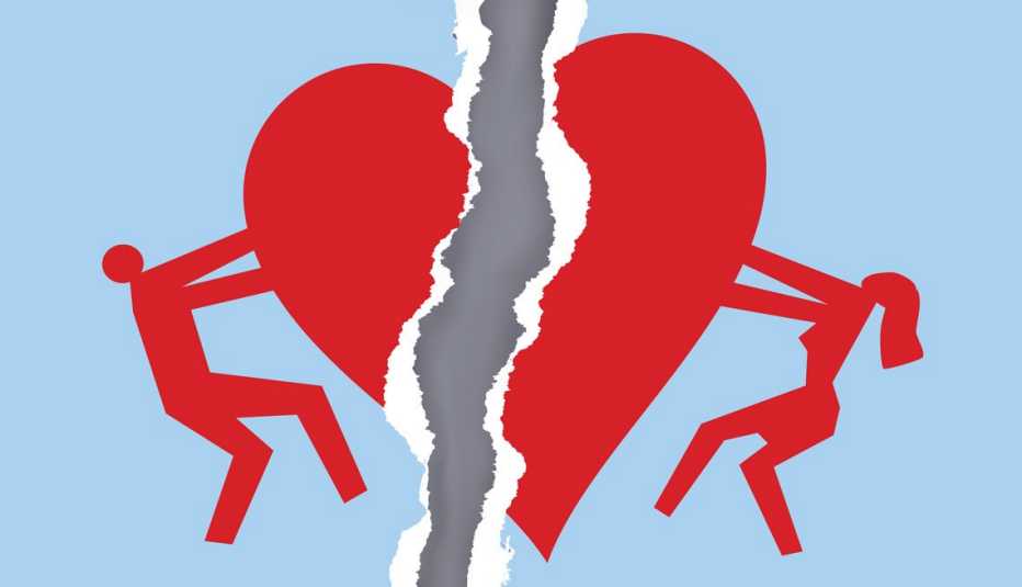 a man and a woman ripping apart a giant paper heart