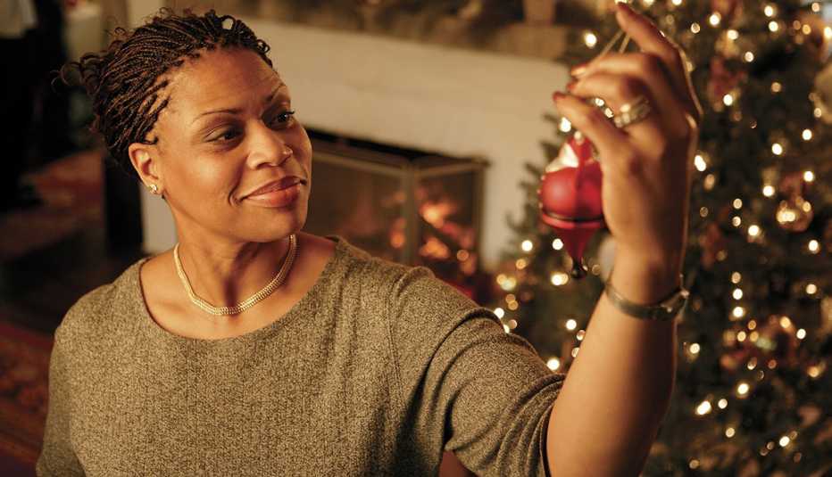 Woman holding ornament