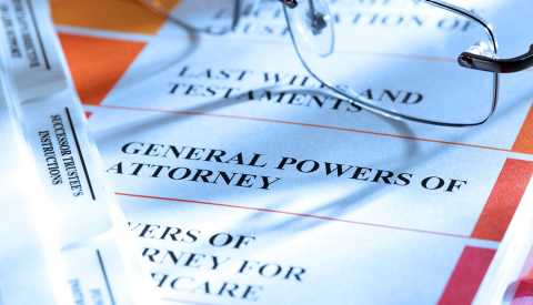 binder of legal documents includes power of attorney and last will and testament