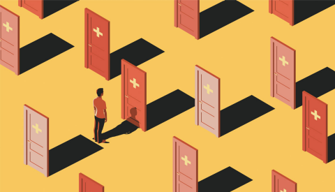 person stands at a door marked with a first aid cross there are a series of many doors and the person is wondering which is the best choice