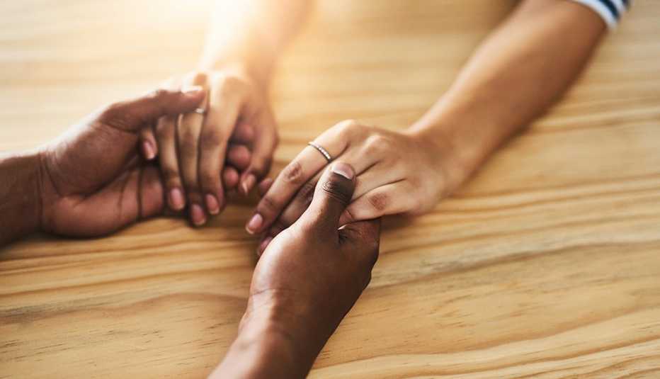 Man and woman holding hands