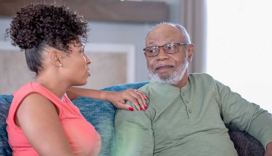 Woman having a serious talk with her father
