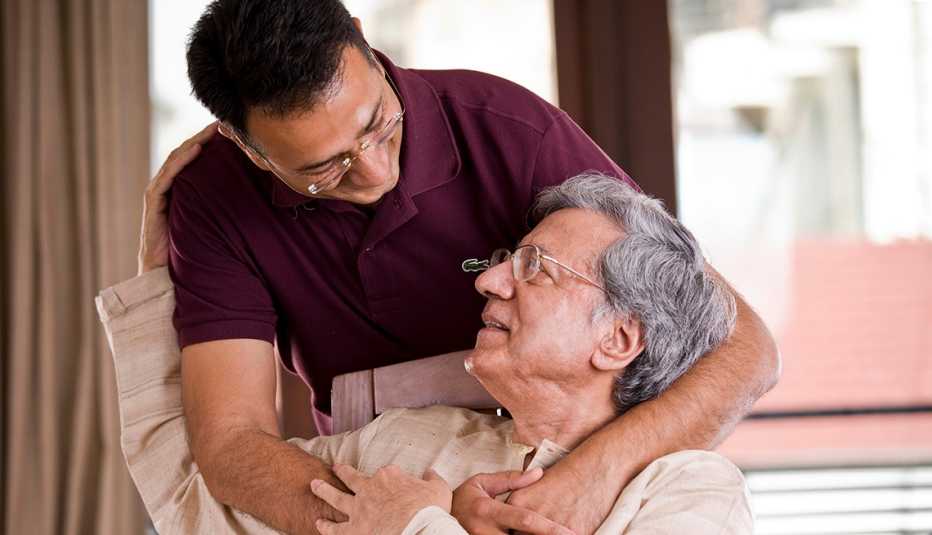 Adult man hugging his father