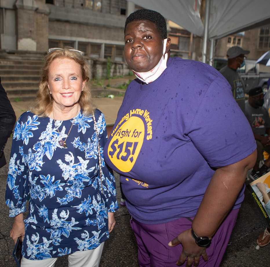 tamara blue a member of the s e i u healthcare michigan union with u s rep debbie dingell at a rally in july twenty twenty one