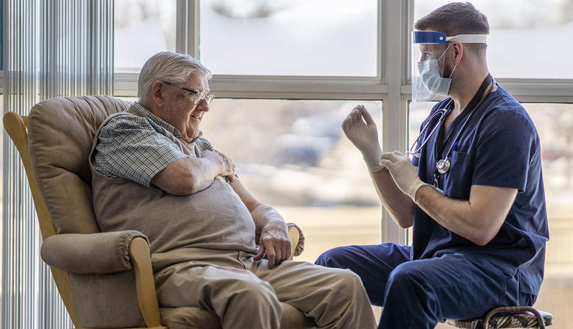 A nursing home resident getting a covid 19 vaccination