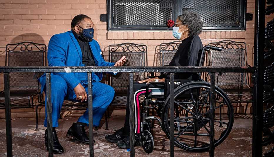 the reverend derrick dewitt talking with his aunt gerri alston