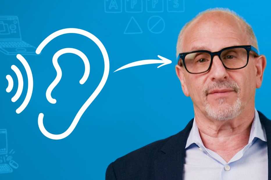 Ed Baig wearing glasses as an hearing aid alternative. 