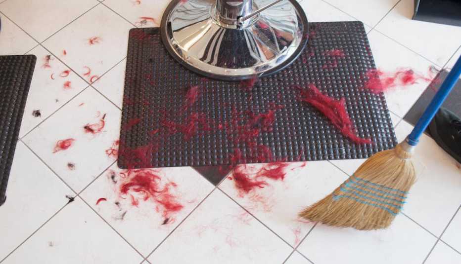 The dirty floor of a hair salon.