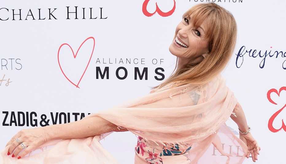 Jane Seymour with a soft warm strawberry br-onde hair color.