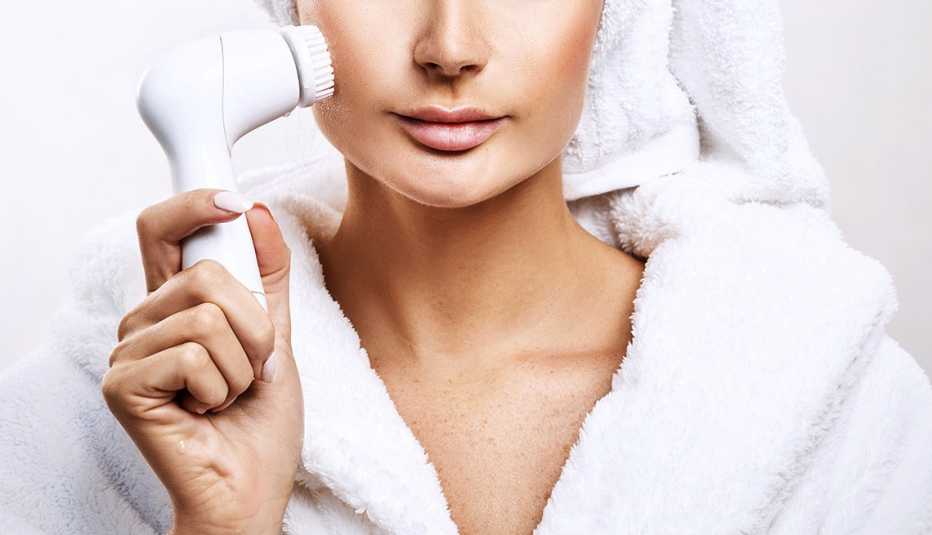 Exfoliate with sonic brush