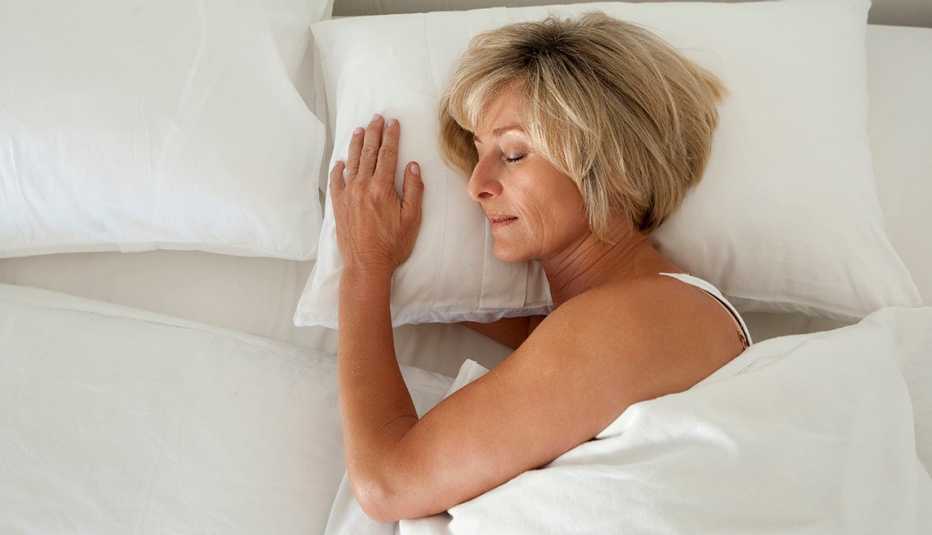 A woman sleeping in bed
