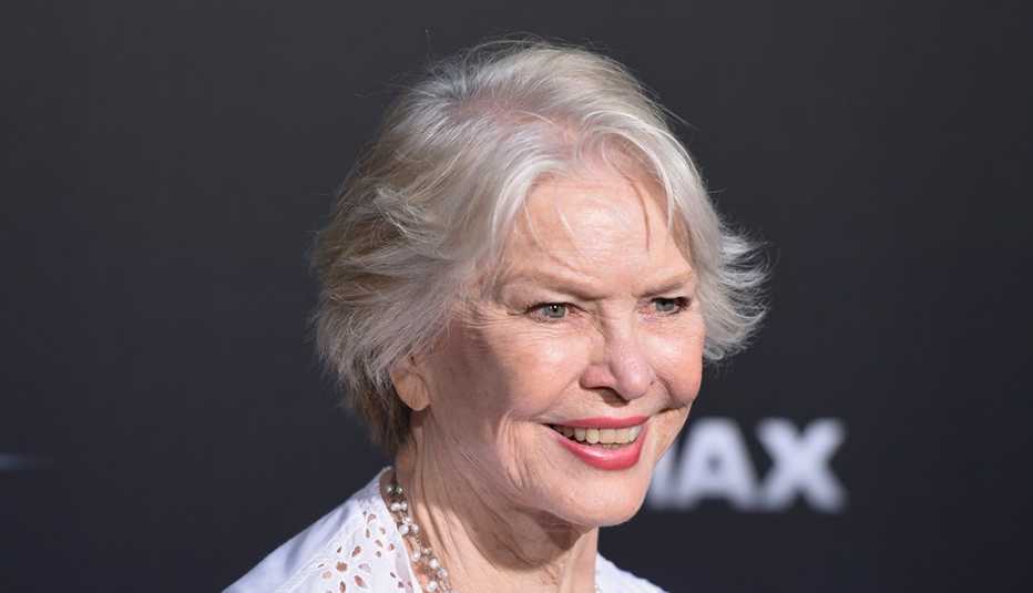 Ellen Burstyn with short grey hair smiling