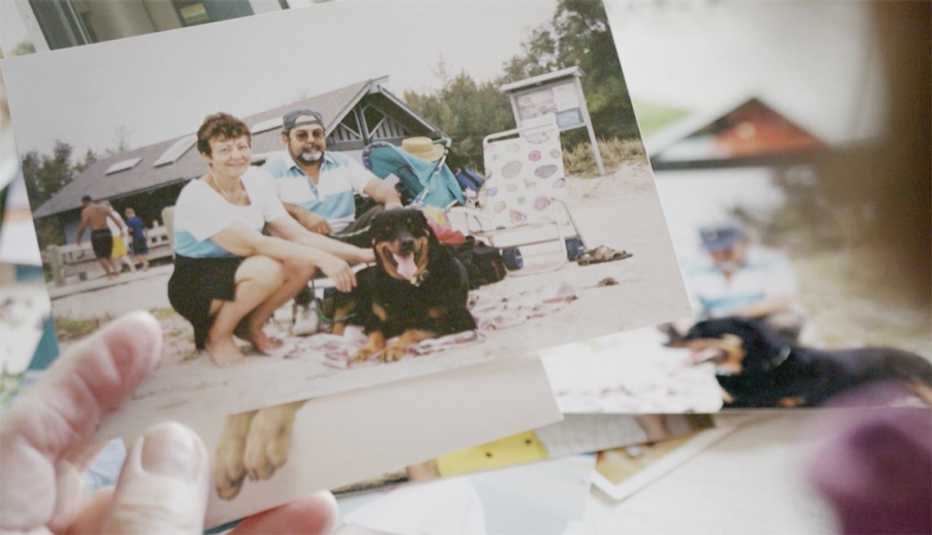 Pet rottweiler and family at the beach
