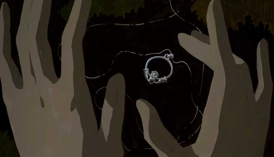 illustration of two hands and silver claddagh necklace