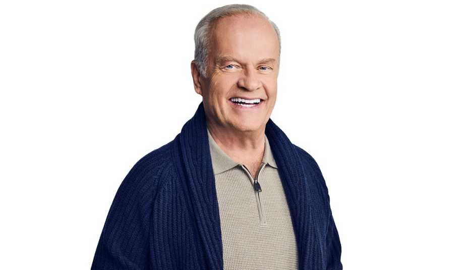 Kelsey Grammer smiling against white background
