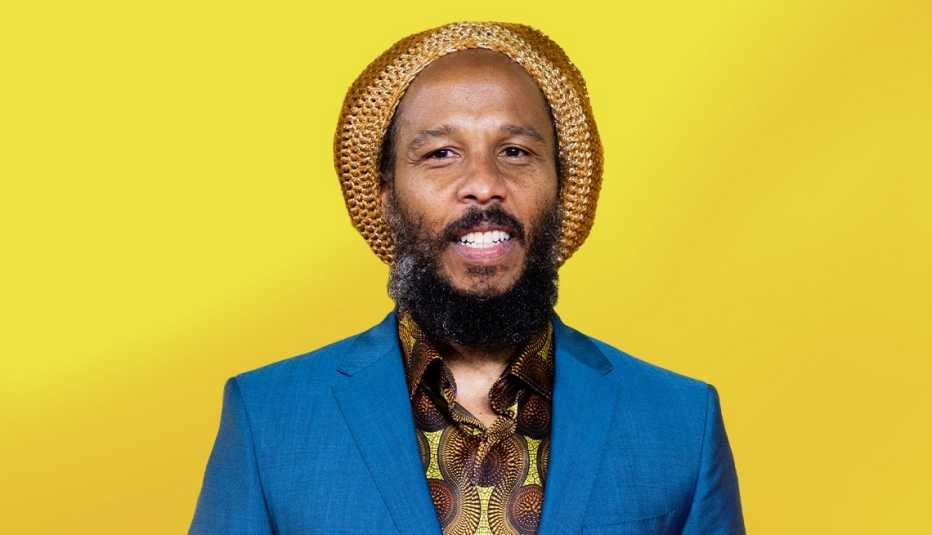 ziggy marley against yellow background