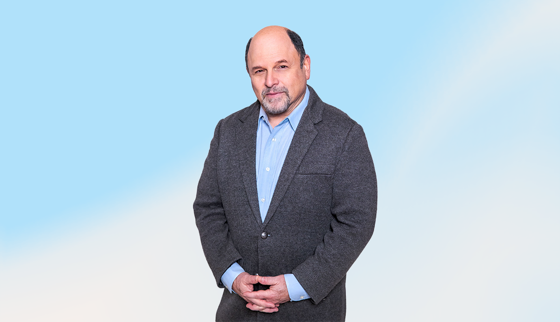 jason alexander against blue and white ombre background