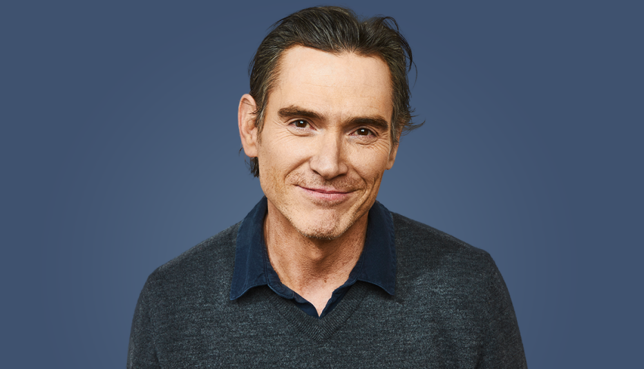 billy crudup against blue background