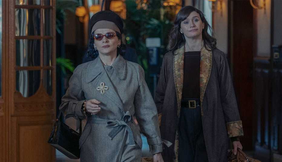 Juliette Binoche and Emily Mortimer in "The New Look" on Apple TV+ juliette binoche and emily mortimer in a still from the new look