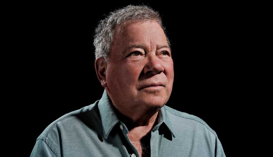 headshot of william shatner on black background