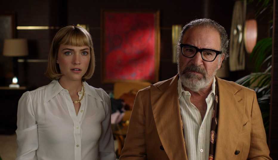 Violett Beane as Imogene Scott and Mandy Patinkin as Rufus Cotesworth on “Death and Other Details” violett beane as imogene scott and mandy patinkin as rufus cotesworth in a still from death and other details