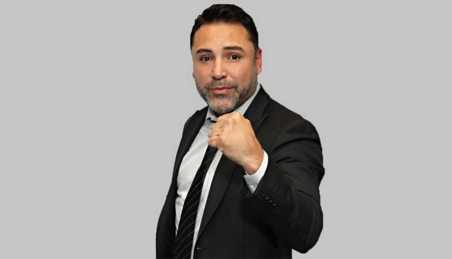 Oscar De La Hoya with his fist raised Oscar De La Hoya with his fist raised