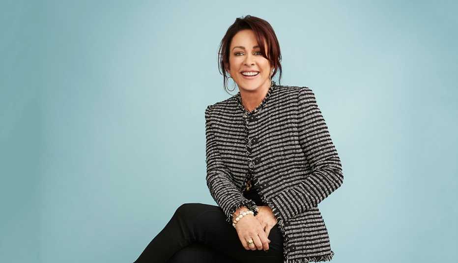 patricia heaton is smiling at the camera