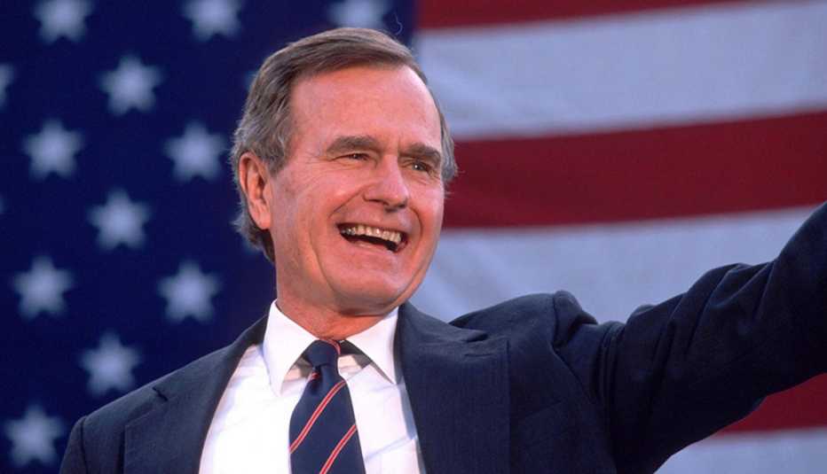George Bush waves to a crowd of supporters November 5, 1988 in the USA. Bush and his running mate Dan Quayle defeat Michael Dukakis in the Presidential election. His efforts to reduce the deficit failed while creating the lowest growth period since the Gr George Bush waves to a crowd of supporters November 5, 1988 in the USA. Bush and his running mate Dan Quayle defeat Michael Dukakis in the Presidential election. His efforts to reduce the deficit failed while creating the lowest growth period since the Gr