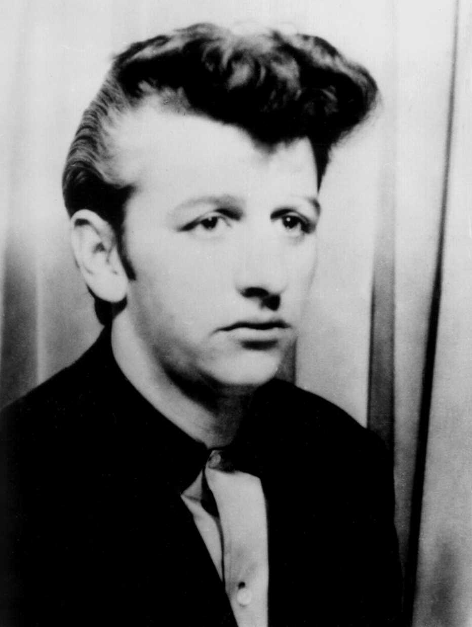 ringo starr poses for a portrait in nineteen fifty nine when he played drums for rory storm and the hurricanes before joining the beatles