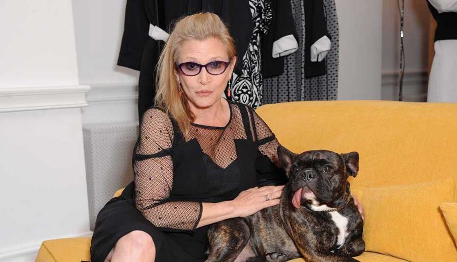 Carrie Fisher attends Marina Rinaldi launch of new atelier on July 3, 2014 in London, England.