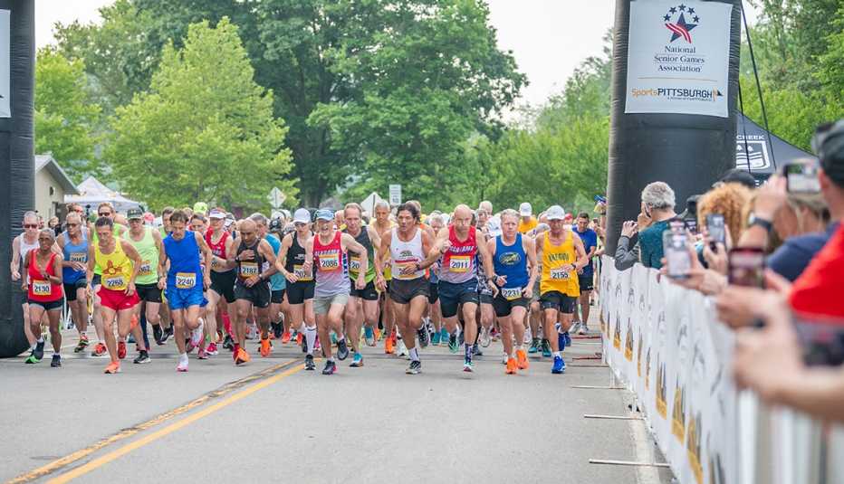 people fifty plus at the starting line of the road race at the national senior games in pittsburgh