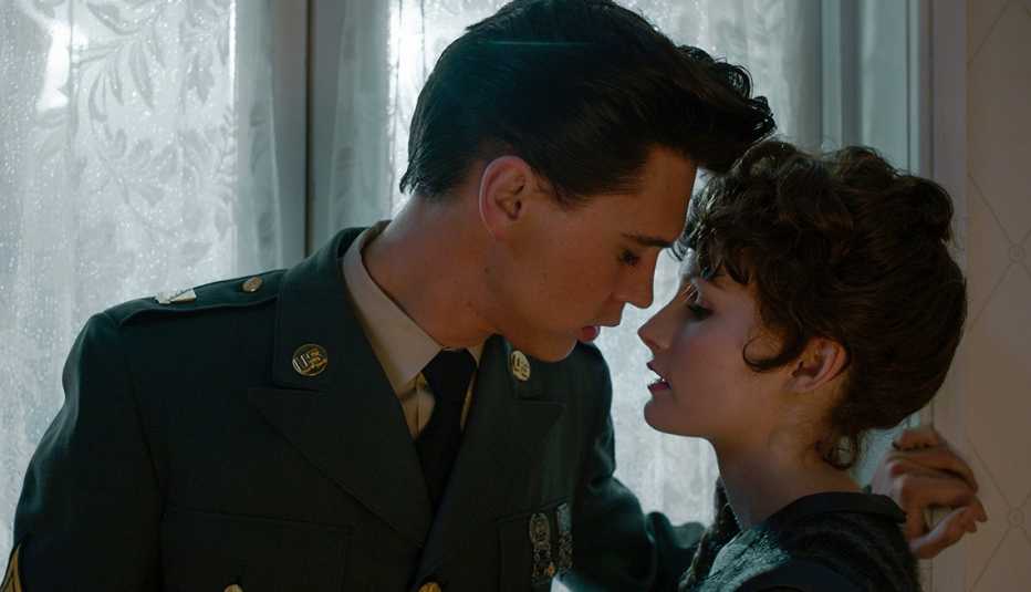 Austin Butler and Olivia deJonge face each other up close with their eyes closed in the film Elvis