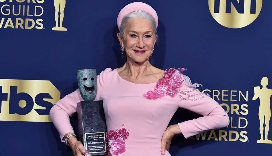 Actress Helen Mirren poses with her life achievement award in the press room at the 28th annual Screen Actors Guild Awards
