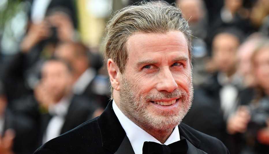 John Travolta wearing a tux. John Travolta wearing a tux.