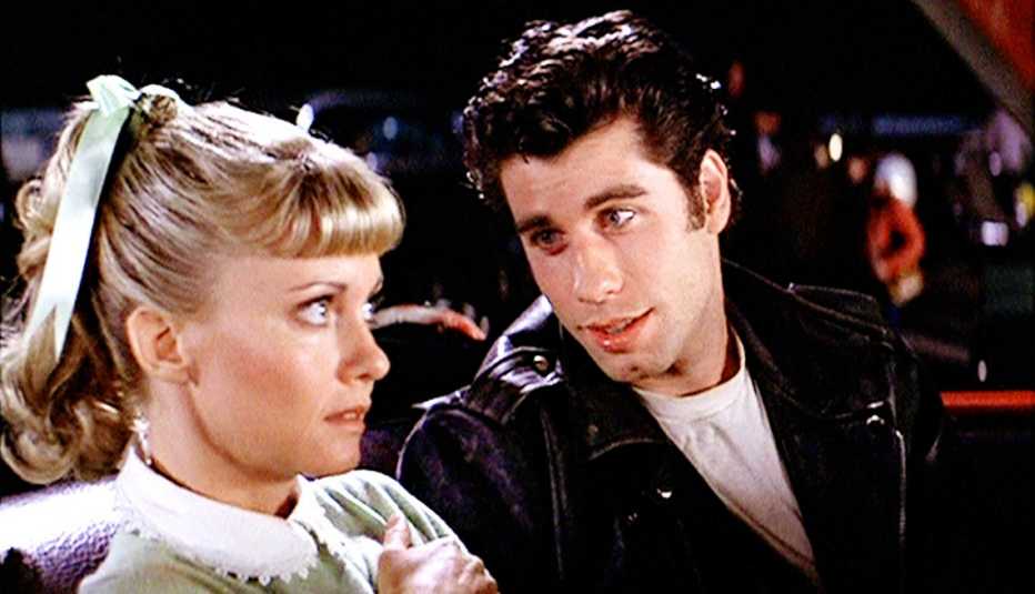 Olivia Newton John and John Travolta in the drive in scene during the film Grease