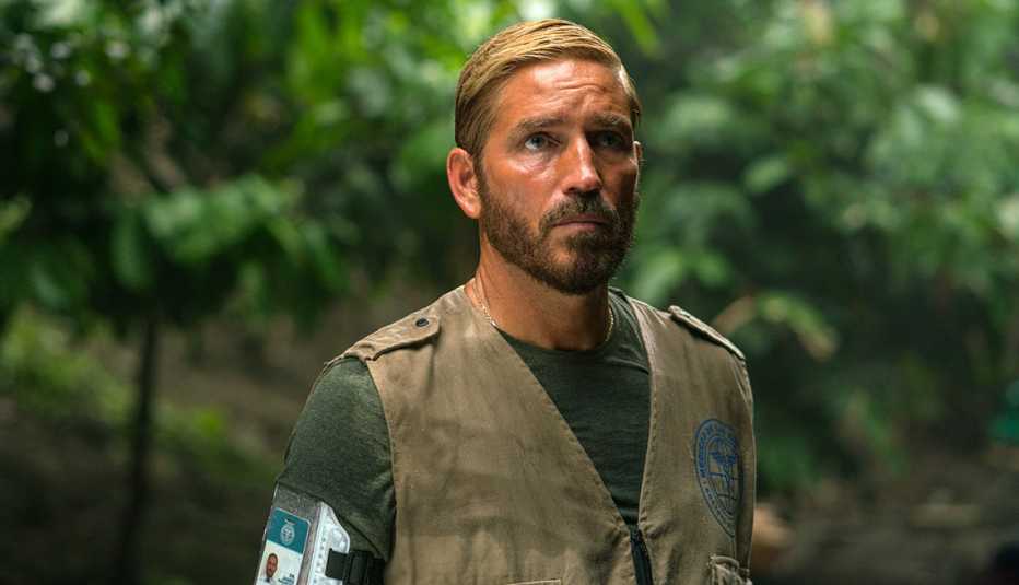 Jim Caviezel as Tim Ballard in the film, "Sound of Freedom." jim caviezel in a scene from the film sound of freedom
