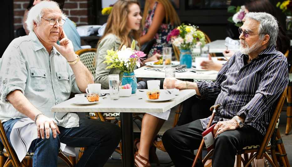 Sonny (Chevy Chase) with Vic Edwards (Burt Reynolds) at Cafe in  the movie, 'The Last Movie Star’  