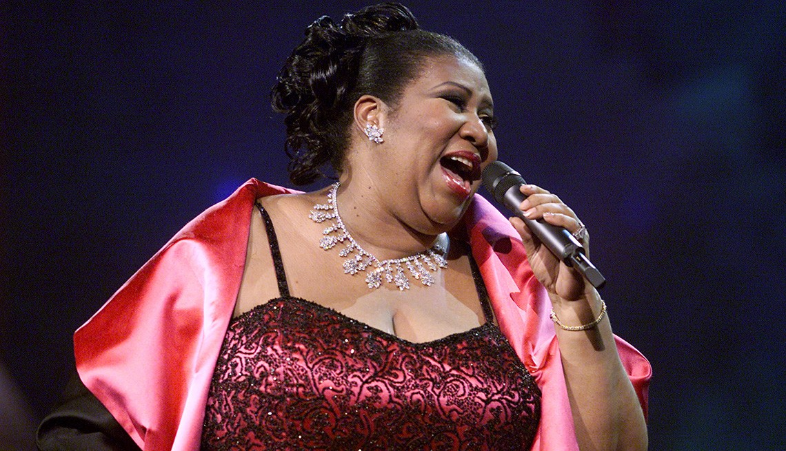 Aretha Franklin on stage. Aretha Franklin on stage.